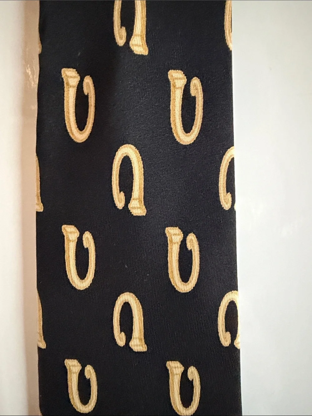 Gucci Black Silk Tie with Gold Horseshoe Motif